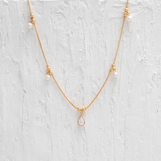 Elegant Pearl Tear Drop Gold Necklace, symbolizing timeless sophistication and delicate elegance.