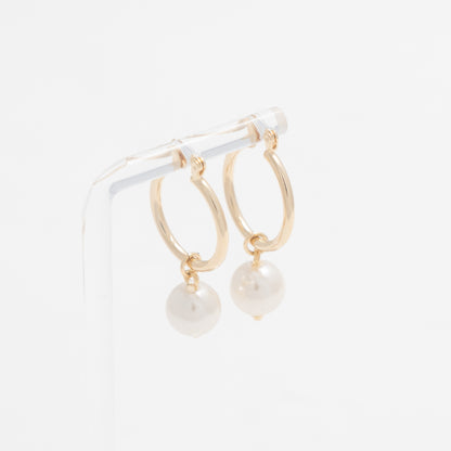 Versatile Gold Hoops with Dangling Pearl, embodying refined grace and modern sophistication.