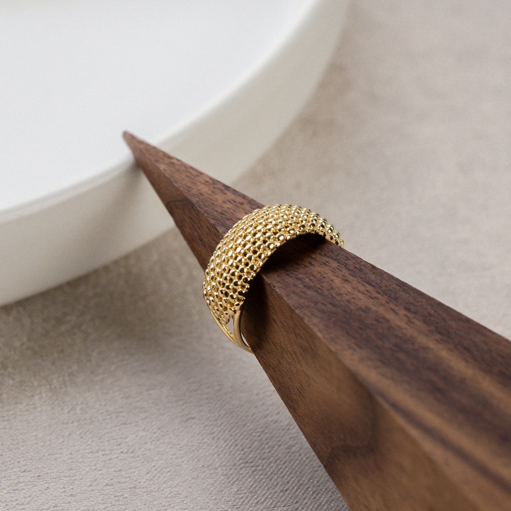 Side profile of Gold Mesh Ring, emphasizing its texture.